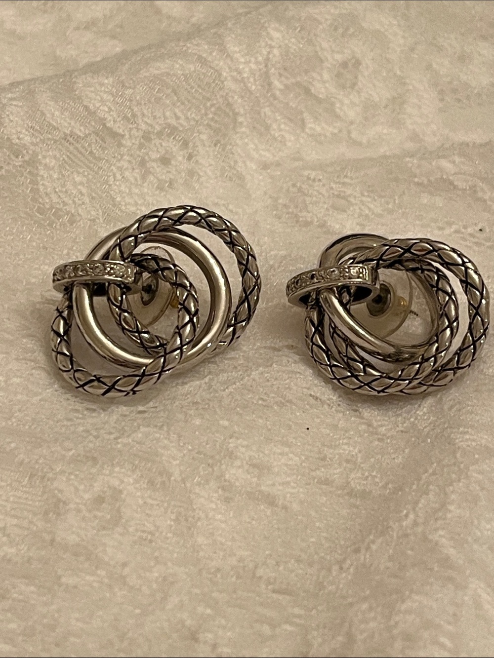 Silver Tone Interwoven Knot Stud Earrings - Silver